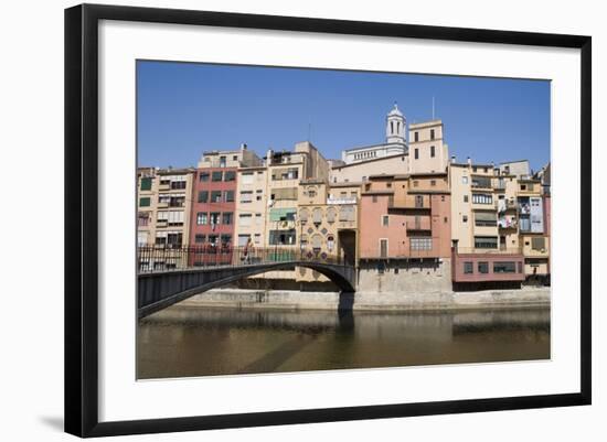 Bridge and Brightly Painted Houses on the Bank of the Riu Onyar-Martin Child-Framed Photographic Print