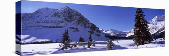 Bridge Covered with Snow, Bow Lake, Mt Thompson, Portal Peak, Banff National Park, Alberta, Canada-null-Stretched Canvas