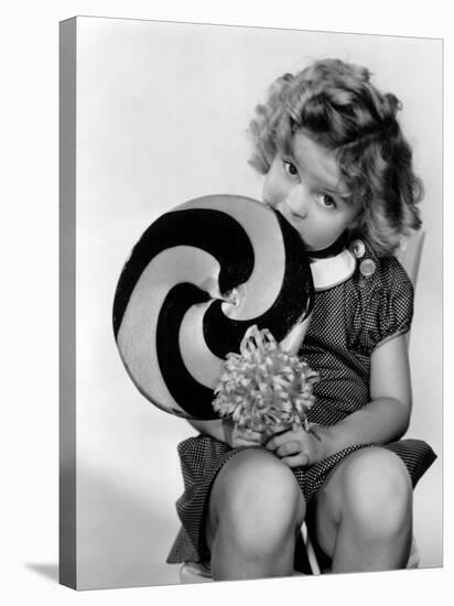 Bright Eyes, Shirley Temple Eating a Big Lollipop, 1934-null-Stretched Canvas