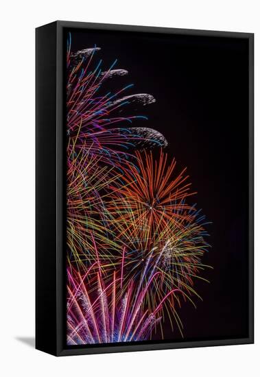 Bright Fireworks in the Sky on Black Background Vertical Image-mbolina-Framed Stretched Canvas