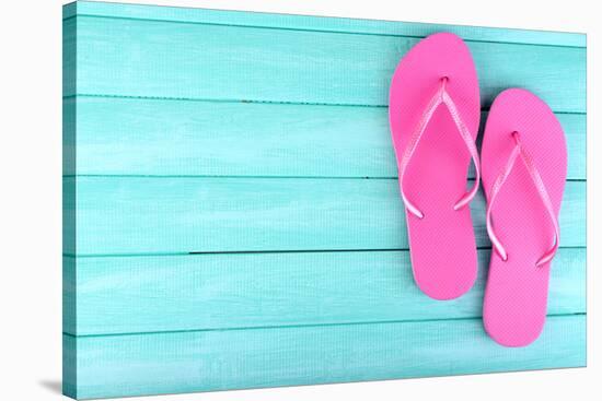 Bright Flip-Flops on Color Wooden Background-Yastremska-Stretched Canvas