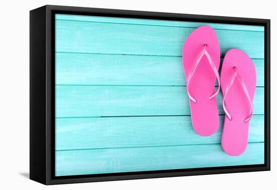 Bright Flip-Flops on Color Wooden Background-Yastremska-Framed Stretched Canvas