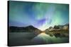 Bright night sky with Aurora Borealis (Northern Lights) over mountains and Skagsanden beach-Roberto Moiola-Stretched Canvas