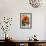 Bright orange flowers on display on kitchen table-Stacy Bass-Framed Photo displayed on a wall