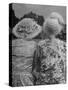 Brightly Dressed Spectators Attending the Event-Cornell Capa-Stretched Canvas