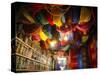 Brightly Dyed Wool Hanging from Roof of a Shop, Marrakech, Morrocco, North Africa, Africa-John Miller-Stretched Canvas