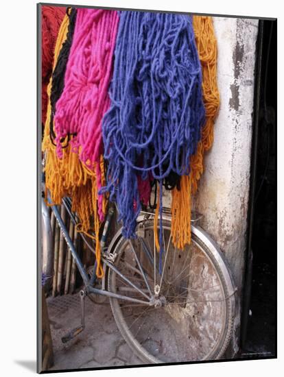Brightly Dyed Wool Hanging Over Bicycle, Marrakech, Morrocco, North Africa, Africa-John Miller-Mounted Photographic Print
