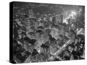 Brightly Lit Office Buildings-Andrew Lopez-Stretched Canvas