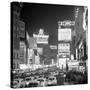 Brightly Lit Signs Shining over Traffic Going Down Broadway Towards Times Square-Andreas Feininger-Stretched Canvas