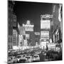 Brightly Lit Signs Shining over Traffic Going Down Broadway Towards Times Square-Andreas Feininger-Mounted Photographic Print