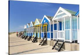 Brightly painted beach huts, Southwold Beach, North Parade, Southwold, Suffolk, England-Neale Clark-Stretched Canvas