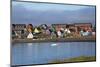 Brightly painted houses on the beach, Qeqertarsuaq, Greenland-Keren Su-Mounted Photographic Print