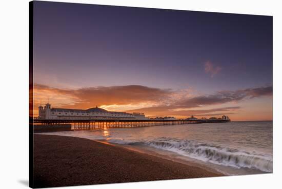 Brighton Pier and beach at sunrise, Brighton, East Sussex, Sussex, England, United Kingdom, Europe-Andrew Sproule-Stretched Canvas