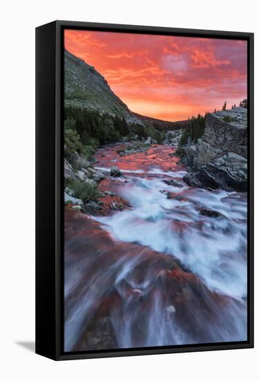 Brilliant Sunrise Sky over Swiftcurrent Falls in Glacier National Park, Montana, Usa-Chuck Haney-Framed Stretched Canvas