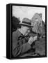 Britain's Prime Minister Winston Churchill Lighting a Cigar-null-Framed Stretched Canvas