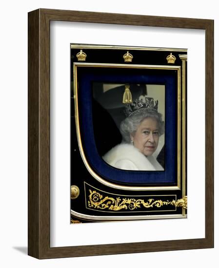 Britain's Queen Elizabeth II Arrives Back at Buckingham Palace in Her State Coach-null-Framed Photographic Print