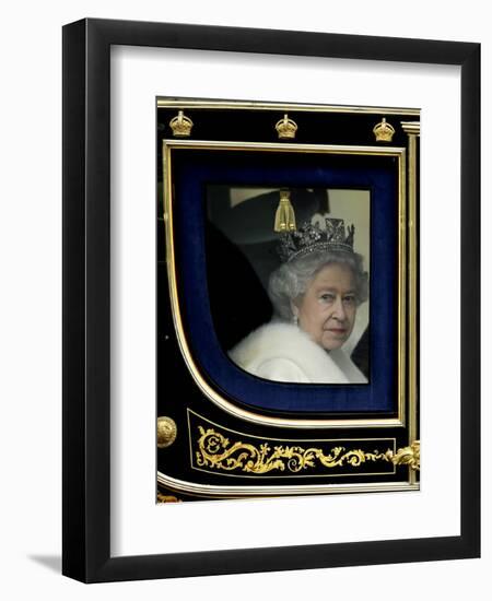 Britain's Queen Elizabeth II Arrives Back at Buckingham Palace in Her State Coach-null-Framed Photographic Print