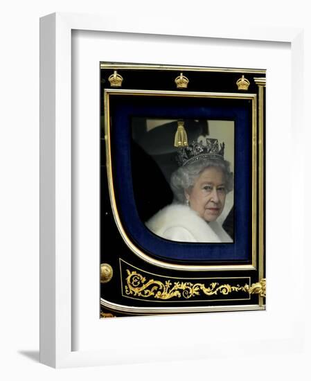 Britain's Queen Elizabeth II Arrives Back at Buckingham Palace in Her State Coach-null-Framed Photographic Print