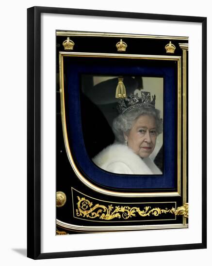 Britain's Queen Elizabeth II Arrives Back at Buckingham Palace in Her State Coach-null-Framed Photographic Print