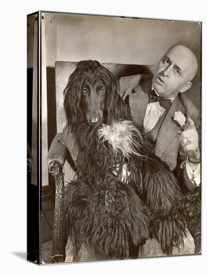 Britain's Top Journalist Vladimir Poliakoff aka "Augur," Posing with His Beloved Afghan Hound-Margaret Bourke-White-Stretched Canvas