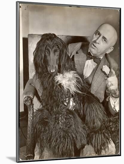 Britain's Top Journalist Vladimir Poliakoff aka "Augur," Posing with His Beloved Afghan Hound-Margaret Bourke-White-Mounted Photographic Print