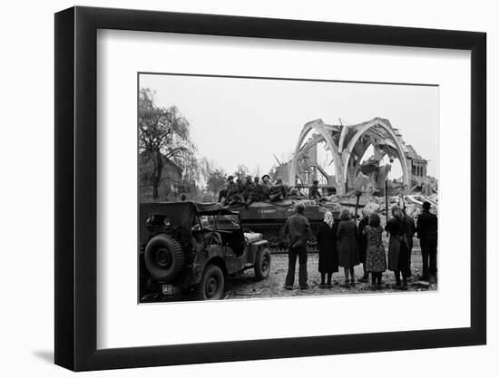 British 49th Armoured Personnel Carrier Regiment Tank Passes Civilians and a Damaged Church-George Silk-Framed Photographic Print