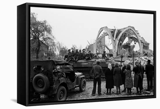 British 49th Armoured Personnel Carrier Regiment Tank Passes Civilians and a Damaged Church-George Silk-Framed Stretched Canvas