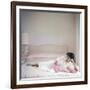 British actress Joan Collins in a pink bedroom with a pink toy poodle (photo)-null-Framed Photo