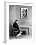 British Born Film Director Posing Beside Fireplace at Home with Pet Sealyham Terrier, Mr. Jenkins-Peter Stackpole-Framed Premium Photographic Print