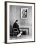 British Born Film Director Posing Beside Fireplace at Home with Pet Sealyham Terrier, Mr. Jenkins-Peter Stackpole-Framed Premium Photographic Print