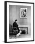 British Born Film Director Posing Beside Fireplace at Home with Pet Sealyham Terrier, Mr. Jenkins-Peter Stackpole-Framed Premium Photographic Print