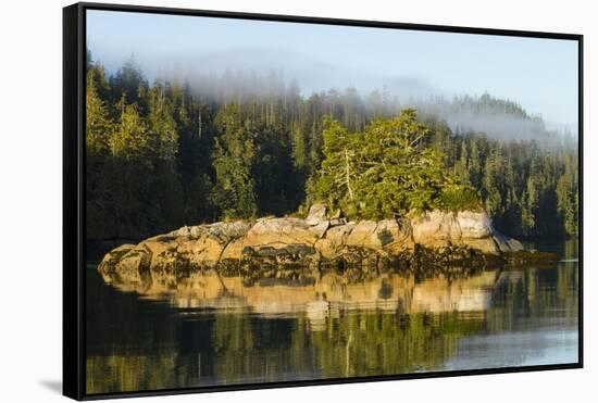 British Columbia. Rocky islands reflect in the water of Canada's inside passage.-Brenda Tharp-Framed Stretched Canvas