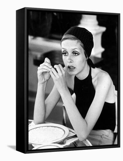 British Fashion Model Twiggy with Slumpy Posture, at Table in Restaurant at Disneyland-Ralph Crane-Framed Stretched Canvas