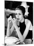 British Fashion Model Twiggy with Slumpy Posture, at Table in Restaurant at Disneyland-Ralph Crane-Mounted Premium Photographic Print