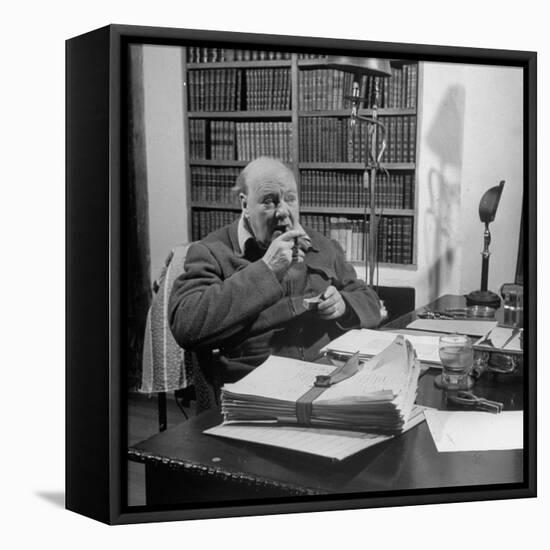 British Leader Winston Churchill Smoking a Cigar at His Desk-Nat Farbman-Framed Stretched Canvas