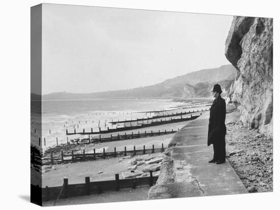 British Police Officer Standing at Foot of Dover Cliffs, Path for Proposed Dover-Calais Tunnel-Ralph Crane-Stretched Canvas