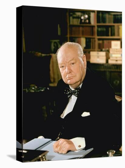 British Politician Sir Winston Churchill, Formal Portrait at Desk-Carl Mydans-Stretched Canvas