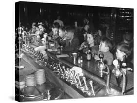 British Refugee Children Eating Ice Cream and Drinking Ginger Ale at a Soda Fountain-John Phillips-Stretched Canvas