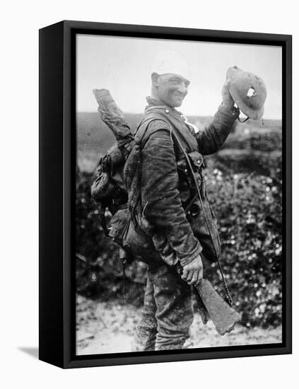 British Soldier with Bandaged Head Shows the Steel Helmet That Saved His Li-English Photographer-Framed Stretched Canvas