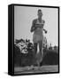 British Track Runner Roger Bannister Running, the First Person to Run a Mile in under Four Minutes-Cornell Capa-Framed Stretched Canvas