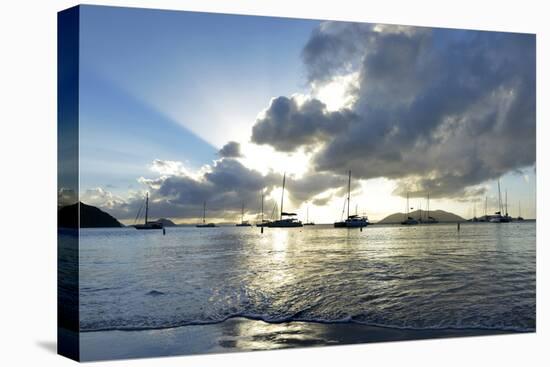 British Virgin Islands, Sandy Cay, Tortola. Sailboats at Anchor in Cane Garden Bay-Kevin Oke-Stretched Canvas