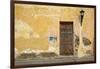 Broken Plaster on Yellow Wall with Old Wood Door-Thom Lang-Framed Photographic Print