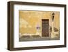 Broken Plaster on Yellow Wall with Old Wood Door-Thom Lang-Framed Photographic Print