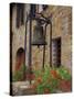 Bronze Bell, Geraniums and Farmhouse, Tuscany, Italy-Merrill Images-Stretched Canvas