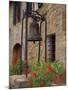 Bronze Bell, Geraniums and Farmhouse, Tuscany, Italy-Merrill Images-Mounted Premium Photographic Print