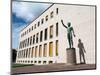 Bronze statue Genio dello Sport outside the Palazzo degli Uffici, Faschist architecture-Jean Brooks-Mounted Photographic Print