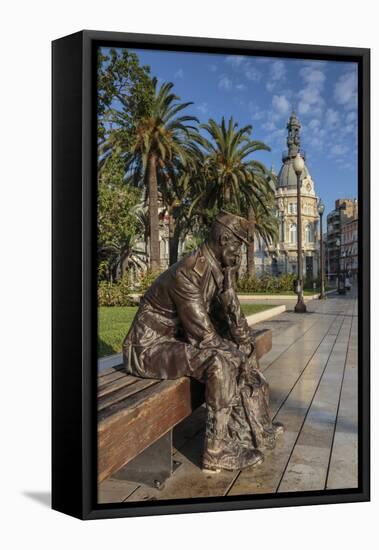 Bronze Statue of a Sailor on a Wooden Bench with Palm Trees-Eleanor Scriven-Framed Stretched Canvas