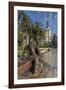 Bronze Statue of a Sailor on a Wooden Bench with Palm Trees-Eleanor Scriven-Framed Photographic Print