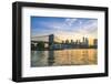 Brooklyn Bridge and Manhattan skyline at dusk, viewed from the East River, New York City, United St-Fraser Hall-Framed Photographic Print