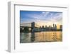 Brooklyn Bridge and Manhattan skyline at dusk, viewed from the East River, New York City, United St-Fraser Hall-Framed Photographic Print